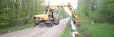 Picture of a machine fixing a ditch