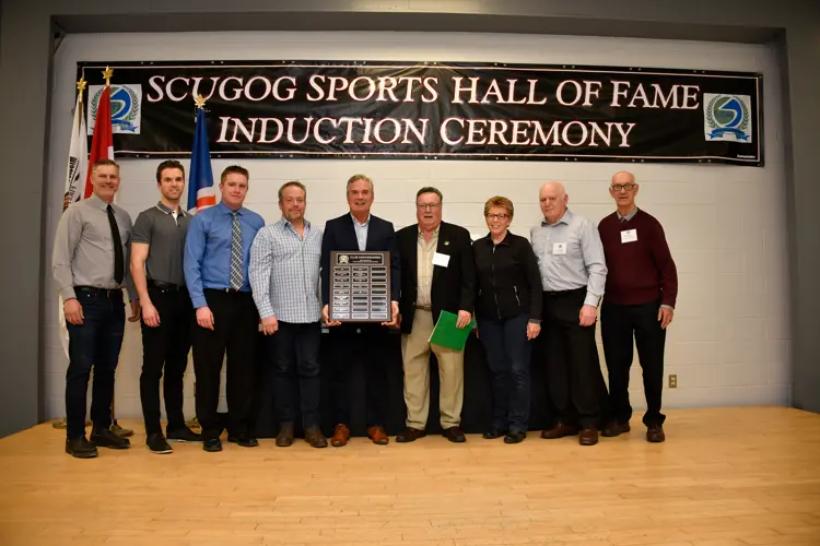 Hall of Fame committe giving MoJack players anniversary plaque