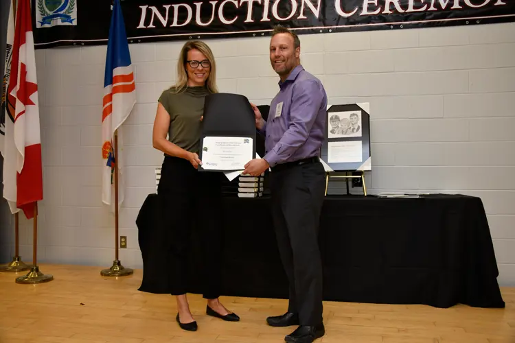 Cartwright soccer volunteer accepting award