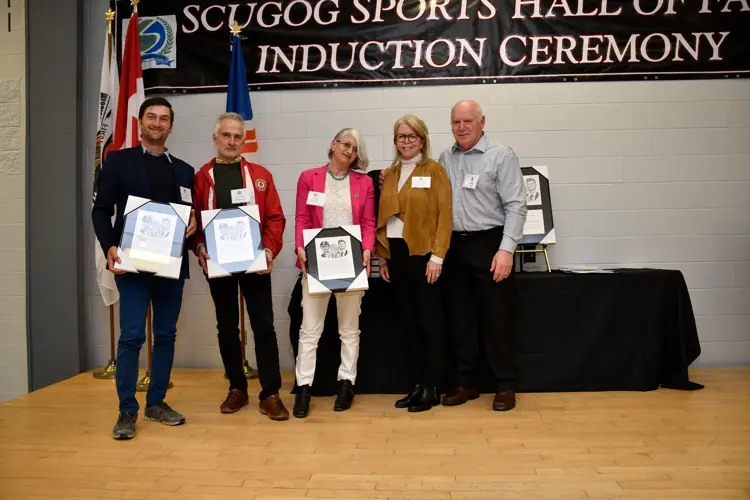 Roberts Family receiving award