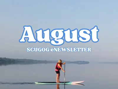 woman on stand up paddleboard on Lake Scugog with centered caption reading 'August Scugog eNewsletter'