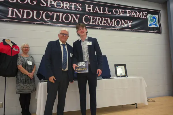 young man receiving award