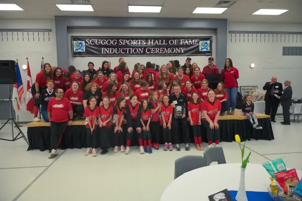 Rick Finlay and Port Perry Angels in front of stage